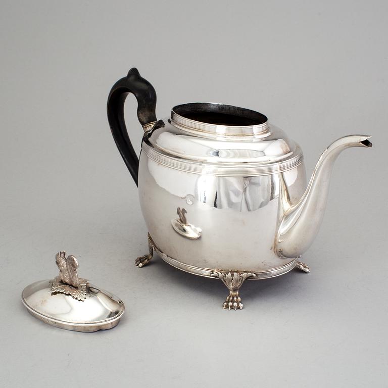 A Swedish 19th century silver tea pot, marked Gustaf Folcker, Stockholm 1820.