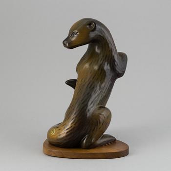 GUNNAR NYLUND, a stoneware sculpture of an otter, Rörstrand, Sweden.