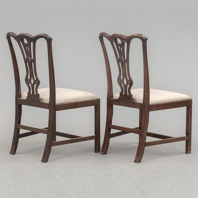 Twelve mid 20th century Chippendale model chairs.