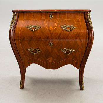 A chest of drawers, mid-20th Century.