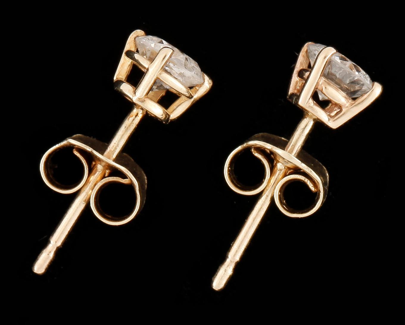 ÖRHÄNGEN, 1 par, 14 k guld, solitära briljantslipade diamanter tot 0.72 ct.