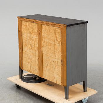 A chest of drawers from the first half of the 20th century.