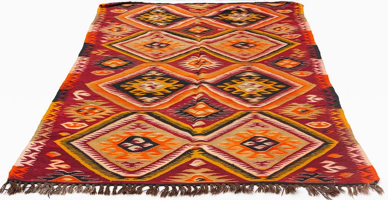 A carpet, old Anatolian kilim, ca 279 x 157 cm.