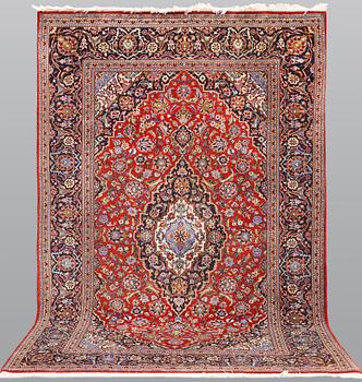 A semi-antique Keshan carpet, approx. 218 x 131 cm.