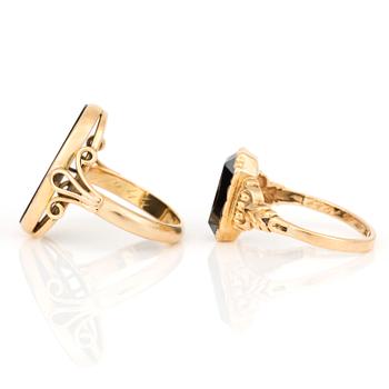 KLACKRINGAR, 2 st, med brun agat och fasetterad hematit, 18K guld.