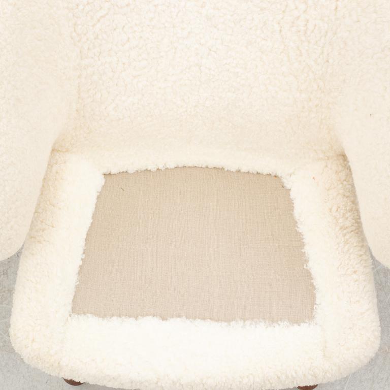 Finn Juhl, a' Pelican Chair' armchair, House of Finn Juhl, Denmark.