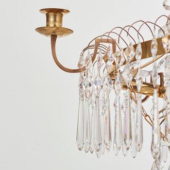 A late Gustavian early 19th century seven-light chandelier by Carl Henrik Brolin (1765-1832, master in Stockholm 1801).