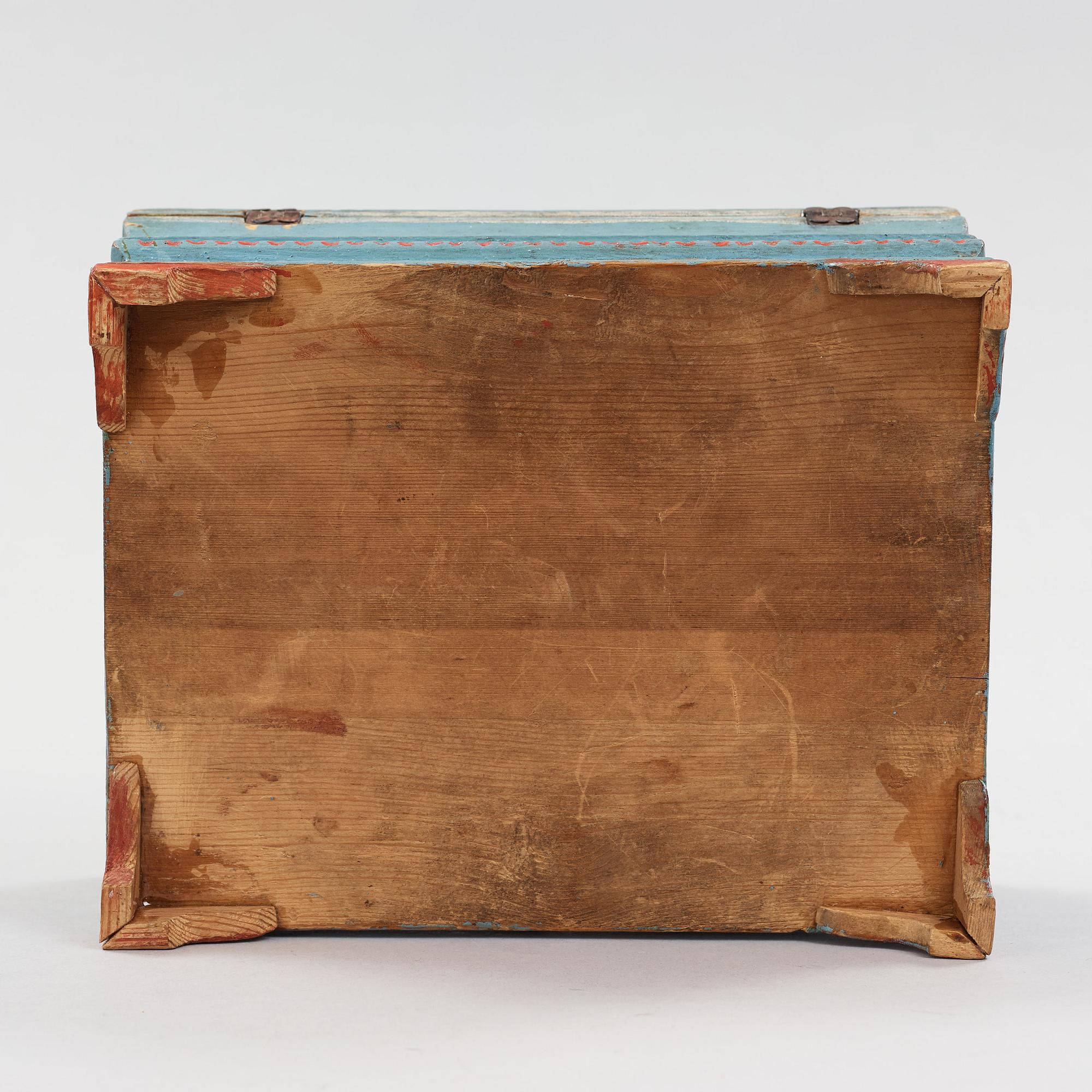 a wooden box marked JJD 1814.