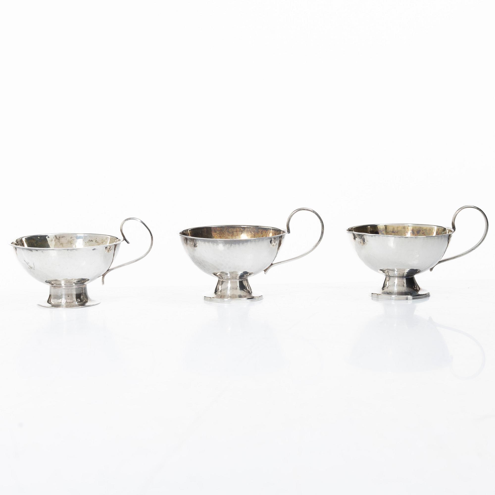 Punchmuggar, 7 st, silver, bl a Cesons, Göteborg 1985.
