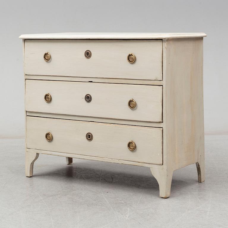 A mid 19th century painted chest of drawers.