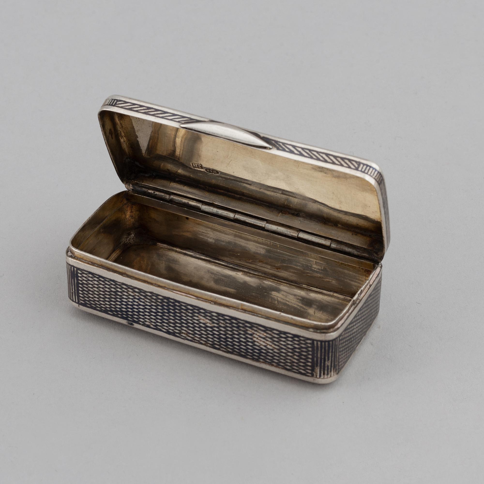 A Russian parcel-gilt silver niello box, unidentified makers mark, Moscow 1888.