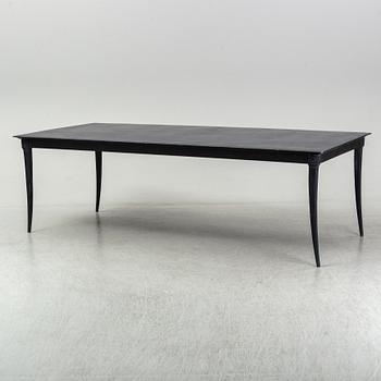 A metal Restoration Hardwood table, 21st Century.