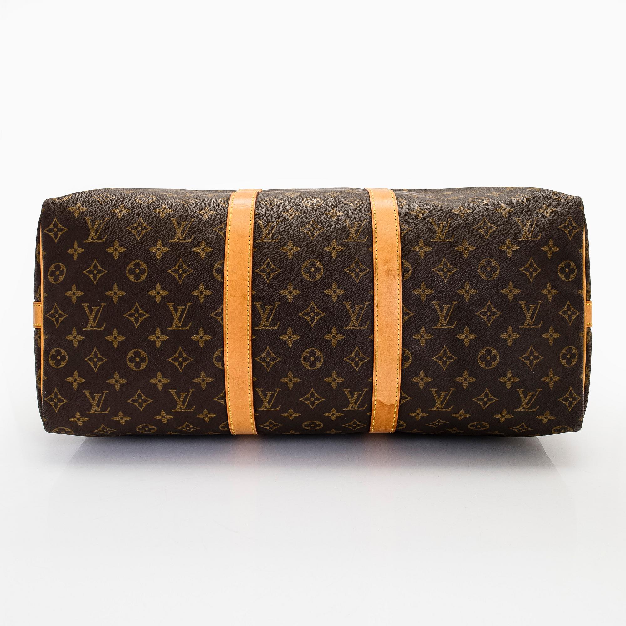 Louis Vuitton, a Monogram Canvas 'Keepall 55 Bandouliere' bag.