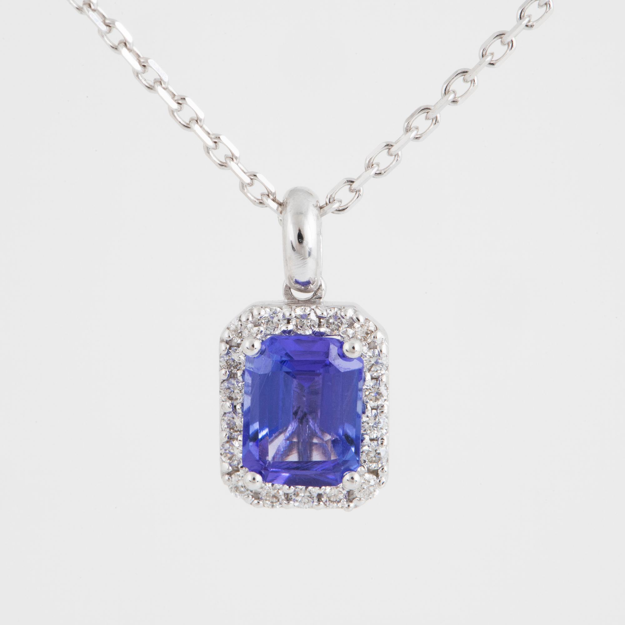 An 18K white gold necklace set with a faceted tanzanite.