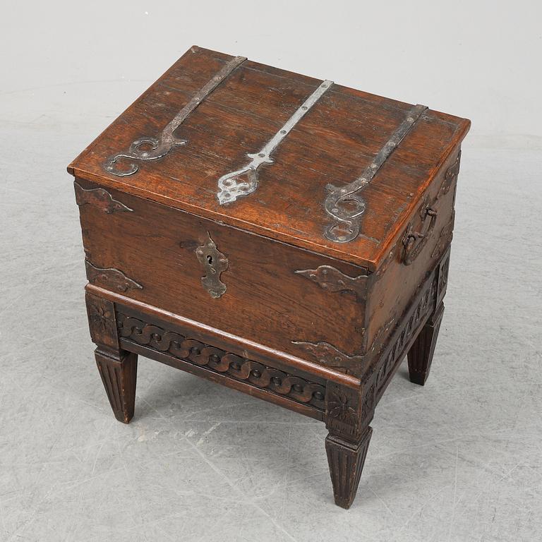 A chest and stand, 19th-20th century.