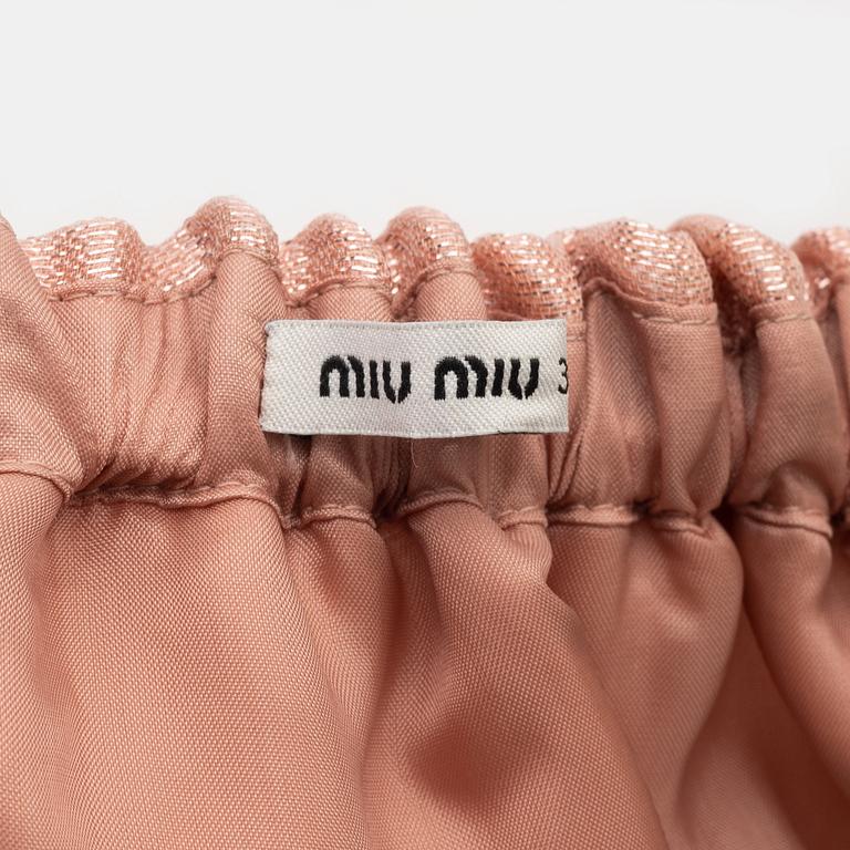 Miu Miu, a silk skirt, size 38.