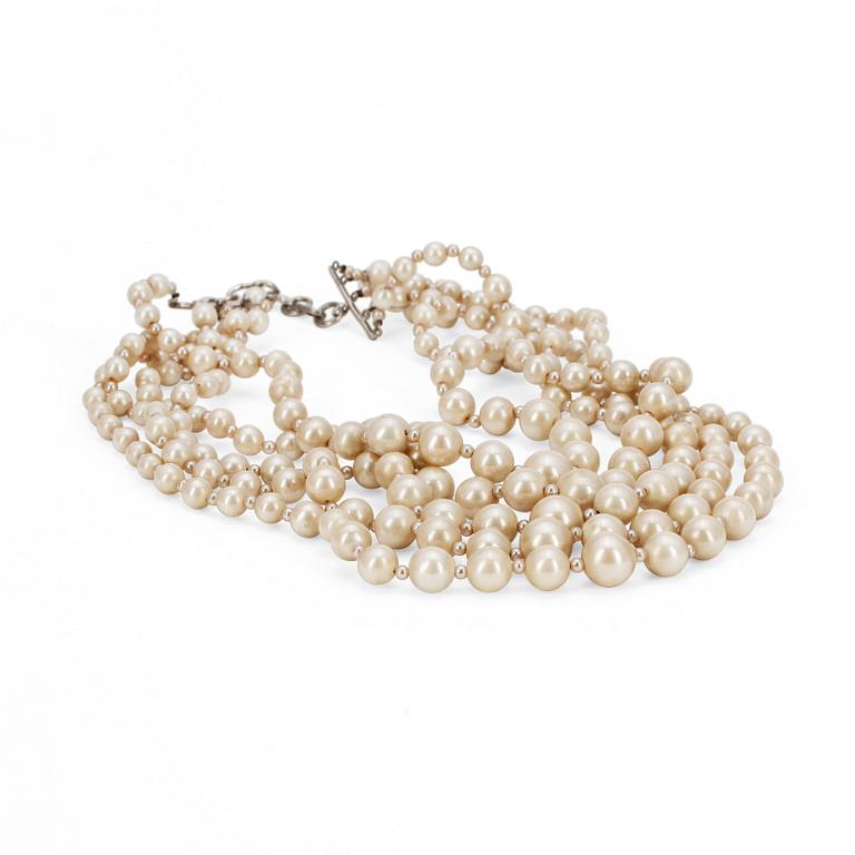 CHRISTIAN DIOR, a necklace with five strand decorative pearls.