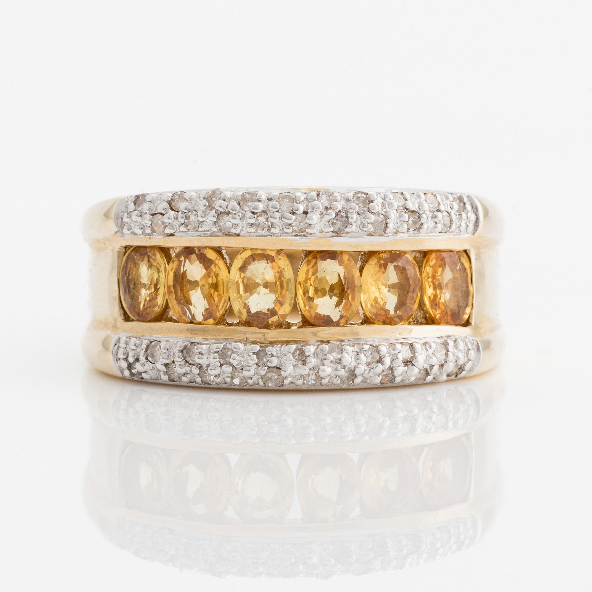 Ring, 14K guld med små diamanter och gula färgade stenar.