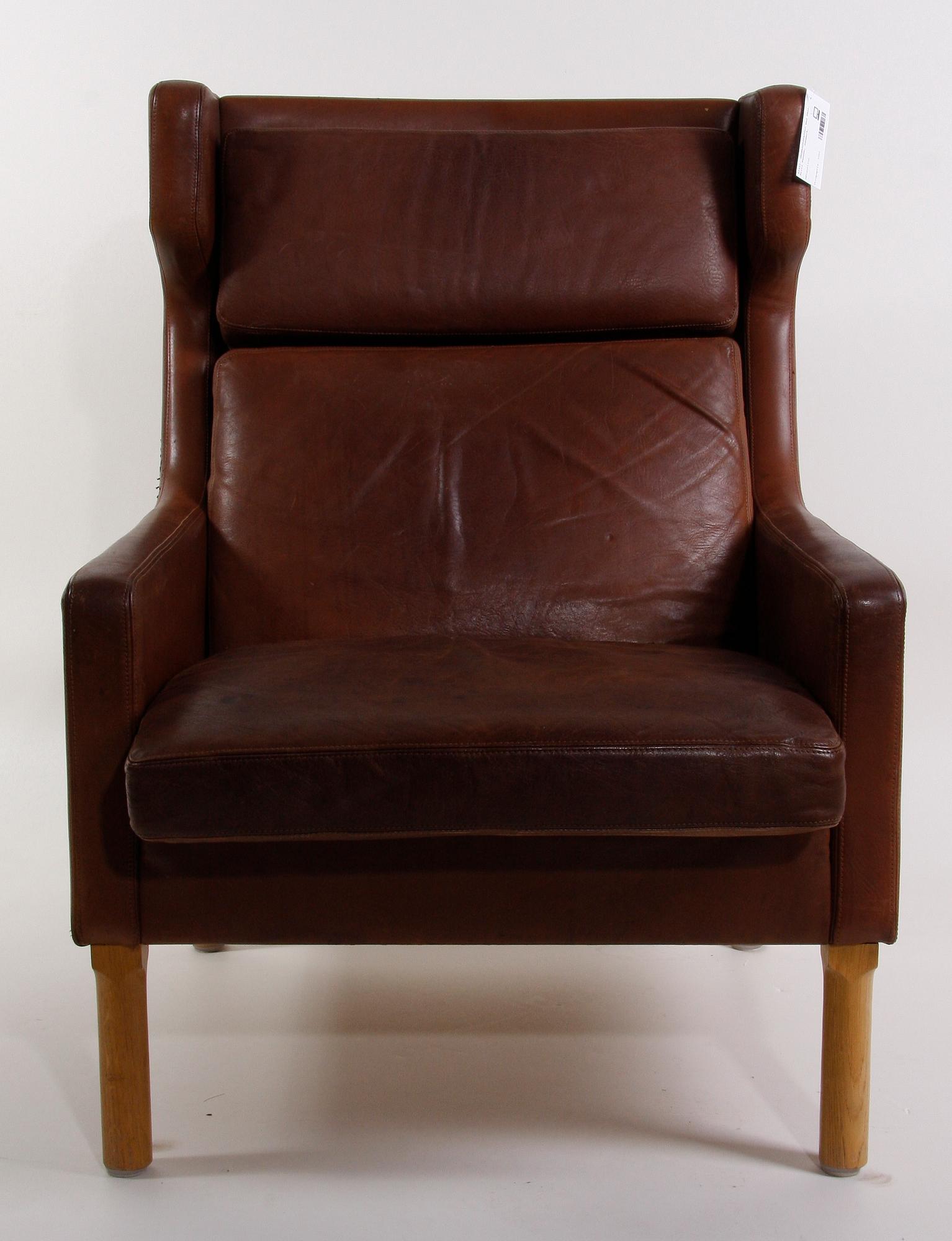 ÖRONLAPPSFÅTÖLJ med PALL, Fritz Hansen, Danmark.