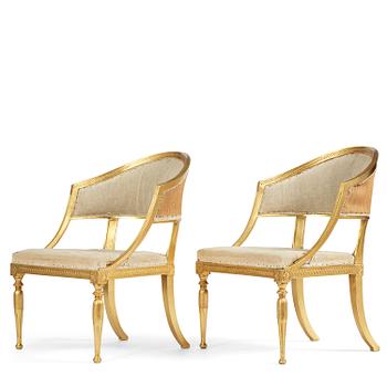 54. A pair of late Gustavian giltwood open-back armchairs, Stockholm, late 18th century.