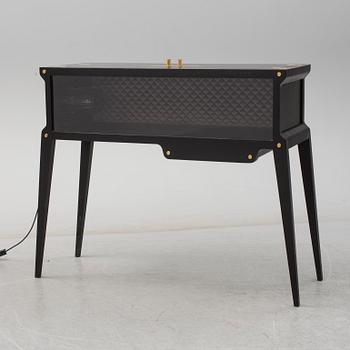 A 21st century 'The Rockstar Bar' cocktail cabinet, Buster & Punch, London.