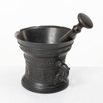Mortar and pestle, dated 1600. Baroque.