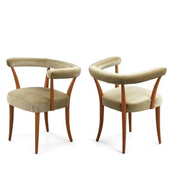 192. Josef Frank, a pair of mahogany horseshoe chairs, Svenskt Tenn, Sweden, mid 20th Century, model 966.