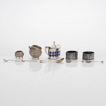 A silver mustard pot and spoon, salt cellars and salt spoons, totally 11 pieces, late 19th century - 20th century.