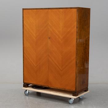 Axel Larsson, an elm and stained birch cabinet, AB Svenska Möbelfabrikerna, Bodafors, 1930/40-tal.