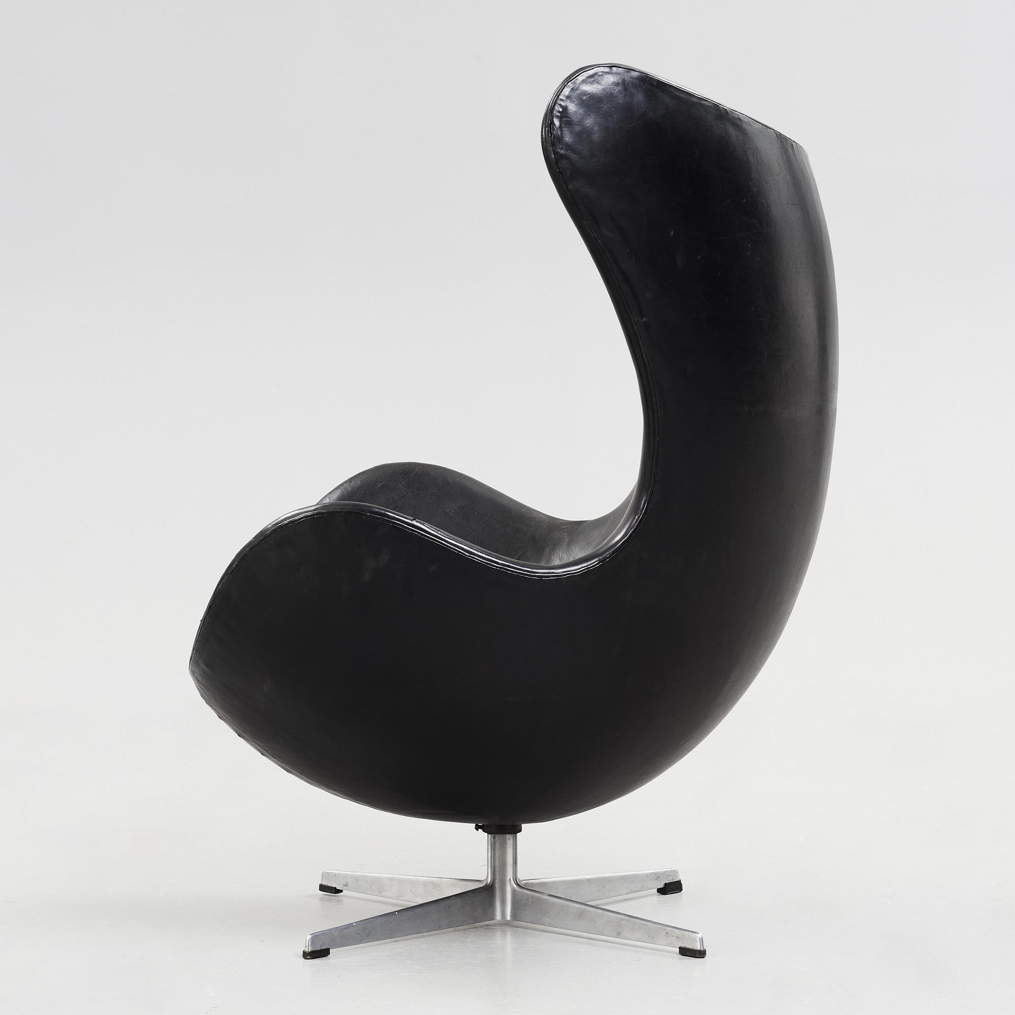 An Arne Jacobsen black leather 'Egg' chair, Fritz Hansen, Denmark 1960's.