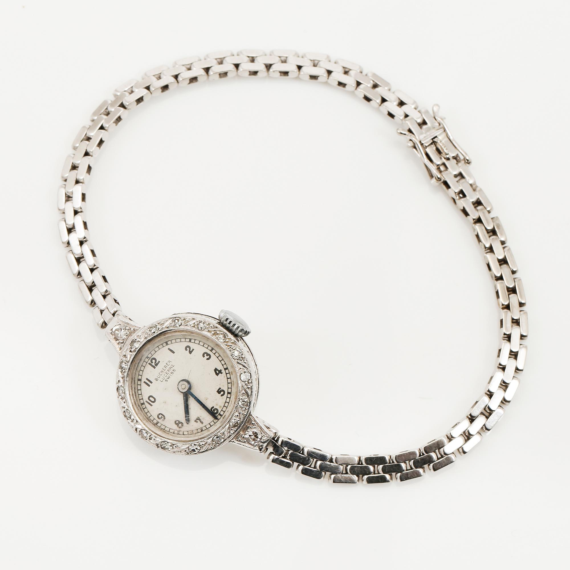 ARMBANDSUR, platina, Bucherer, Lucerne, Swiss, med ARMBAND, 18K vitguld, 1949. Totalvikt med urverk ca 15 gram.