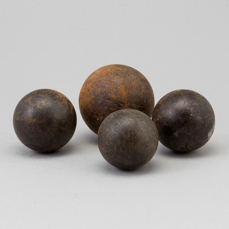 FOUR CAST IRON BULLETS, 18th/19th century.