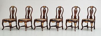 A set of 12 rococostyle chairs, 20 th century.