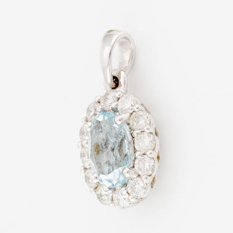 Pendant in 18K white gold with faceted aquamarine and round brilliant-cut diamonds.