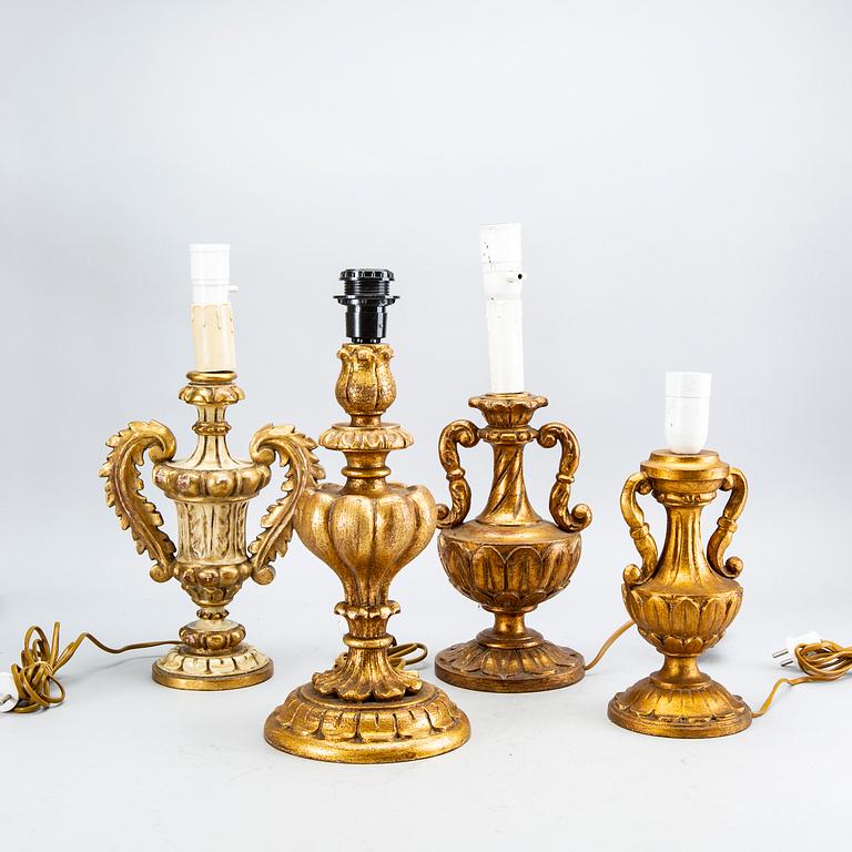 A set of four wood table lamps  from Paoletti, Firenze Italy, second half of 20th century.