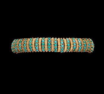 1143. A gold and turquoise bracelet, 1950's.