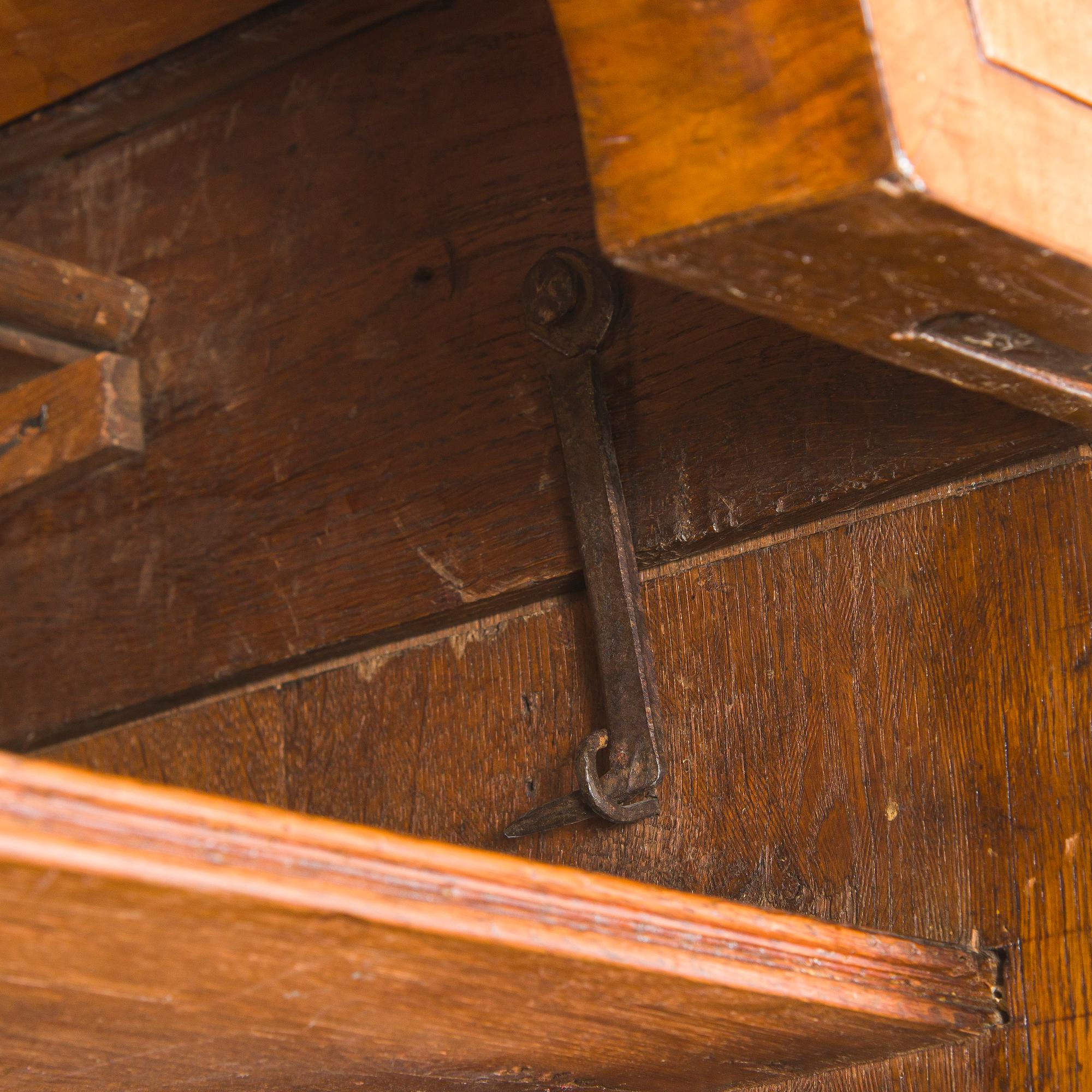 A Swedish walnut-veneered rococo cabinet in the manner of C. Linning, latter half of the 18th Century.