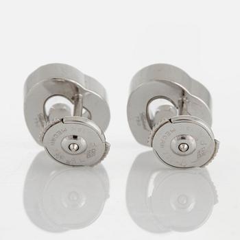 A pair of Chopard "Happy diamonds" earrings in 18K white gold with round brilliant-cut diamonds.