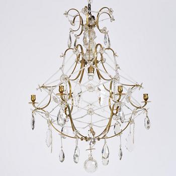 A seven-light gilt brass and cut glass rococo chandelier, mid 18th century.