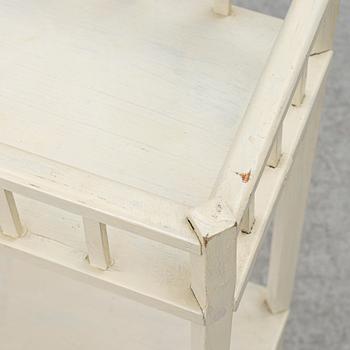 A plant stand, circa 1900.
