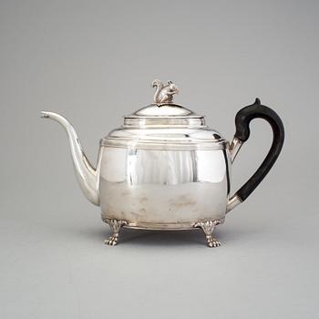 A Swedish 19th century silver tea pot, marked Gustaf Folcker, Stockholm 1820.
