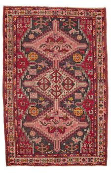 42. A RUG, a semi-antique East European probably, ca 173-175 x 112-116 cm.