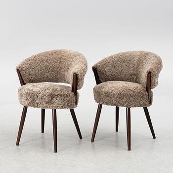 A pair of upholstered armchairs, AB Bröderna Biörs Snickerifabrik, Sweden, 1950's.
