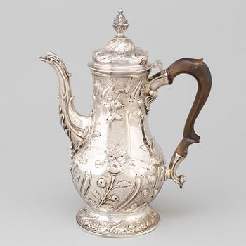 An English 18 th century silver coffee-pot, mark of Benjamin Gignac, London 1763.