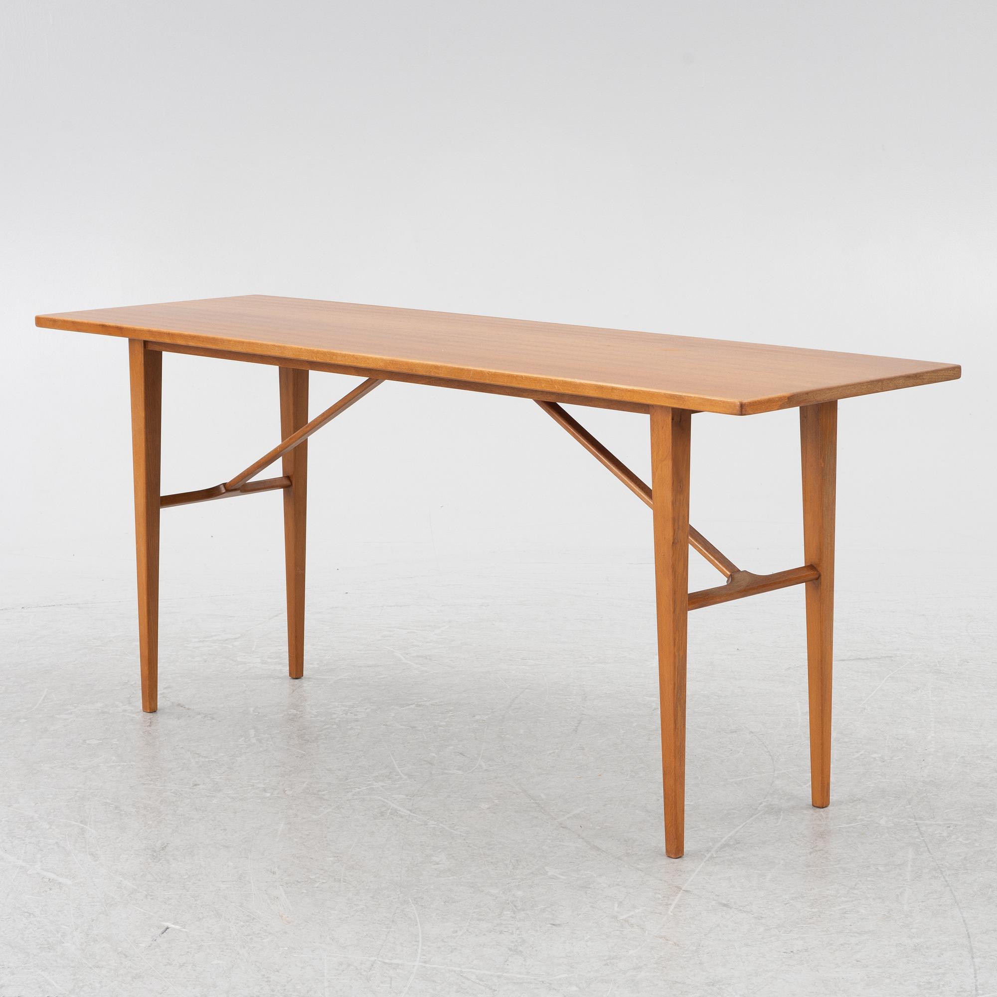 A coffee table/side table, Blomstermåla, circa the mid-20th century.