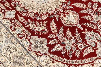 A carpet, Nain part silk s.k 6LAA, 239 x 155 cm.