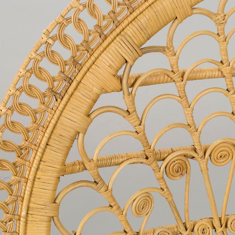 A 20th century wicker chair.