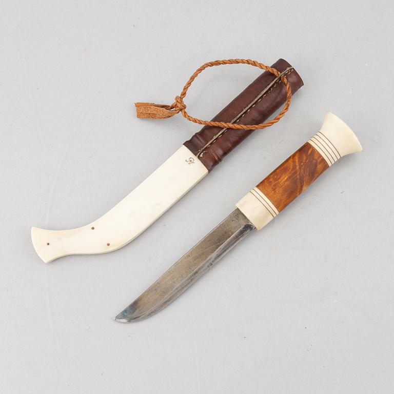 Per Anders Nutti, a reindeer antler knife, signed.