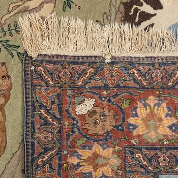 A carpet, semi-antique, Tabriz, signed, ca 271 x 175 cm.