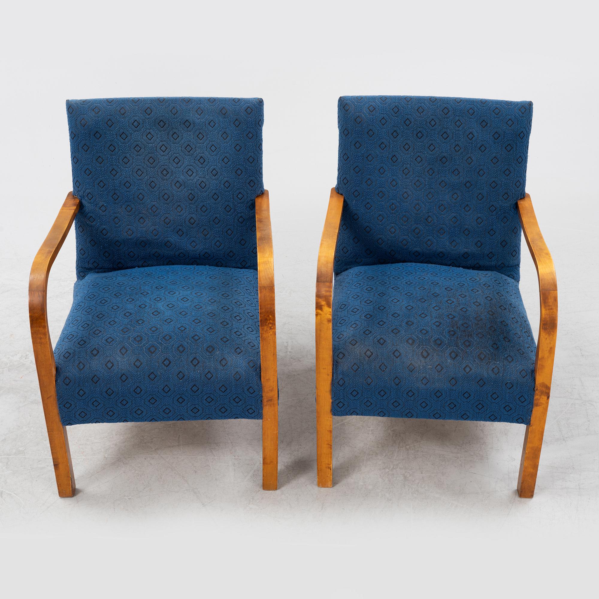 A a pair of stained birch armchairs 1930s-40s.